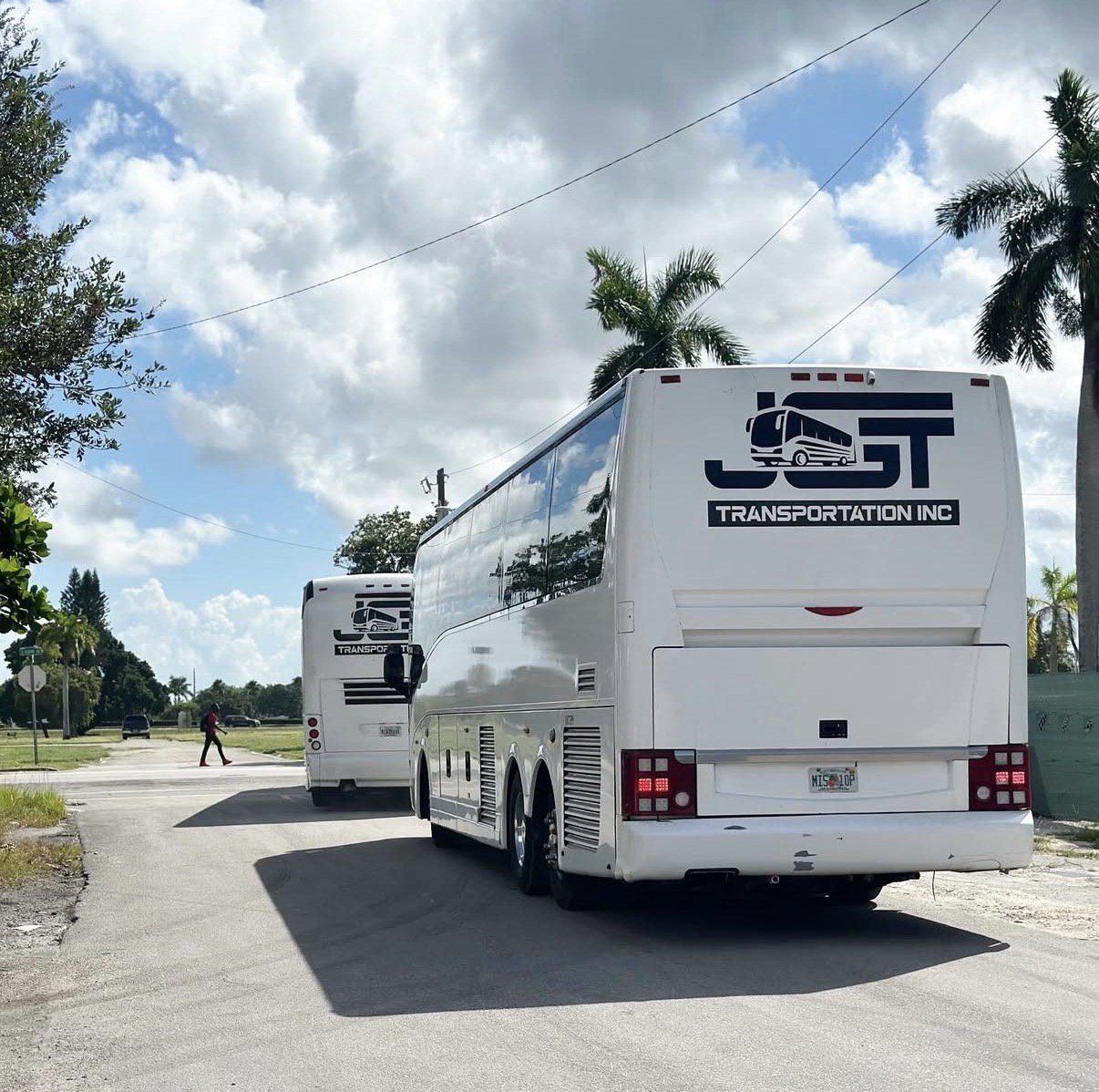 JGT coaches traveling on a road